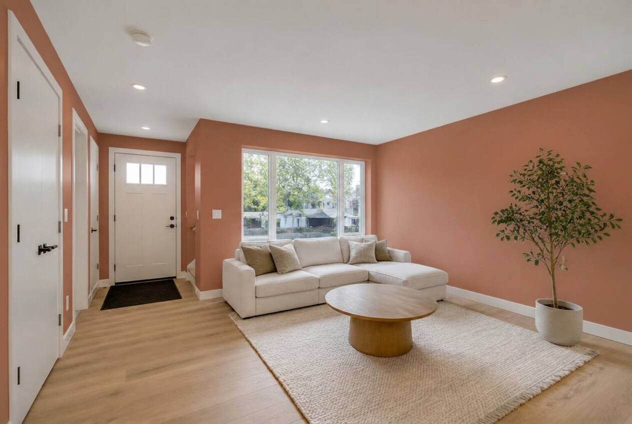 The same living room with walls repainted in Kiln Clay